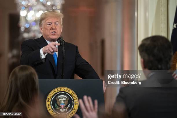 President Donald Trump argues with CNN reporter Jim Acosta during a news conference in the East Room of the White House in Washington, D.C., U.S., on...