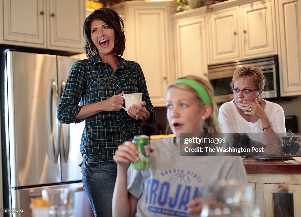 Kristi Noem and her daughter, Kassidy and staffer Beth Hollatz, eat Kristi Noem and her daughter, Kassidy and staffer Beth Hollatz, eat