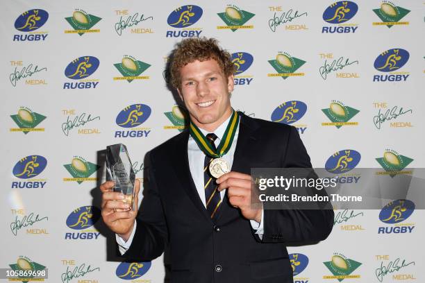 David Pocock poses with the John Eales Medal and Australia's Choice Award following the 2010 John Eales Medal at Carriageworks on October 21, 2010 in...