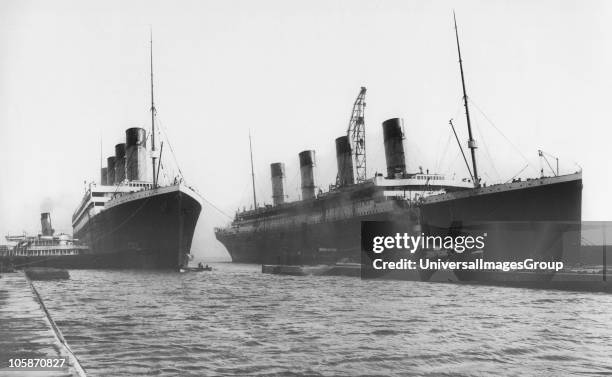 Two White Star Liners RMS Titanic and RMS Olympic, both built by Harland & Wolff, in Belfast seen together for the last time, 3rd February 1912. RMS...