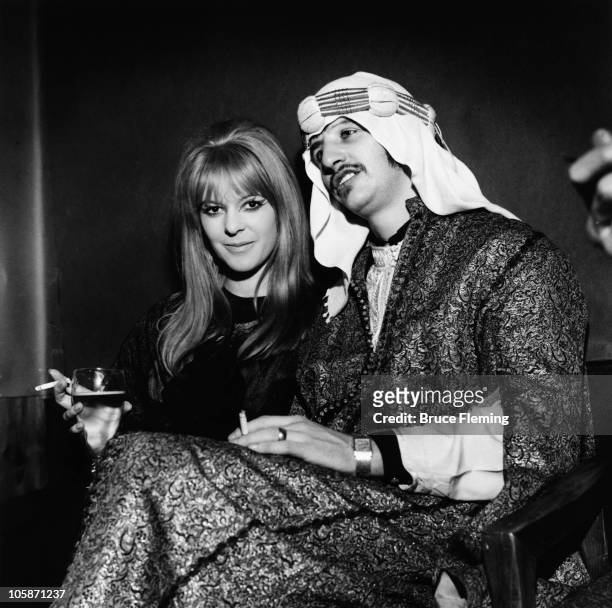 Beatles drummer Ringo Starr with his wife Maureen Starkey at a fancy dress party at the Cromwellian Club, London, 8th January 1967. They are...