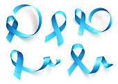 Big set of blue ribbons isolated over white background. Symbol of prostate cancer awareness month in november. Vector