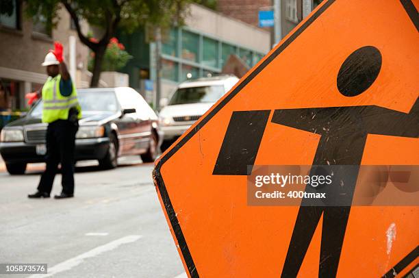 police officer directing traffic - traffic control stock pictures, royalty-free photos & images