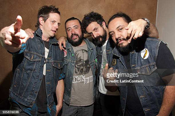 Randy Ebright, Micky Huidobro, Tito Fuentes and Paco Ayala of the Mexican band Molotov pose for a photograph at the backstage before their concert at...