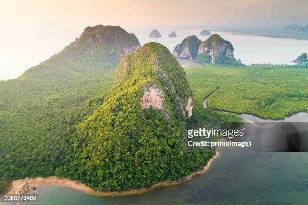 aerial view wide shot beautiful sunset tropical beach sea in south thailand asia - southeast stock pictures, royalty-free photos & images