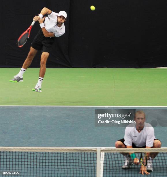 Jeremy Chardy of France and Lukas Dlouhy of Czech Republic in action against Pablo Cuevas of Uruguay and Michael Russell of USA during the XXI...