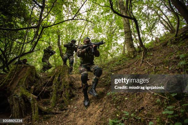 military unit on training class - mercenary human role stock pictures, royalty-free photos & images