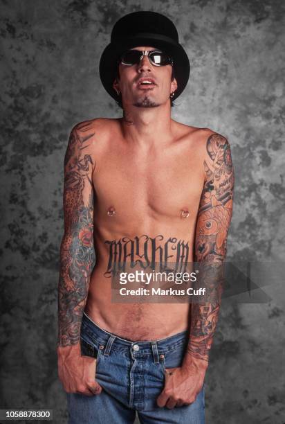 Motley Crue Drummer Tommy Lee poses during a tattoo related portrait session Los Angeles, California on April 25,1997.