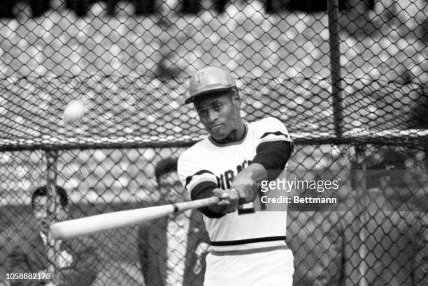 Pittsburgh Pirates slugger Roberto Clemente, who is the tip hitter for the Bucs in the series so far with an average of .471 takes his turn in the...