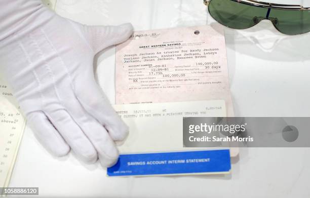 Joe Jackson's bank deposit slip for The Jackson 5 is seen at the Iconic Hollywood & Music Memorabilia Auction media preview at Universal Hilton Hotel...