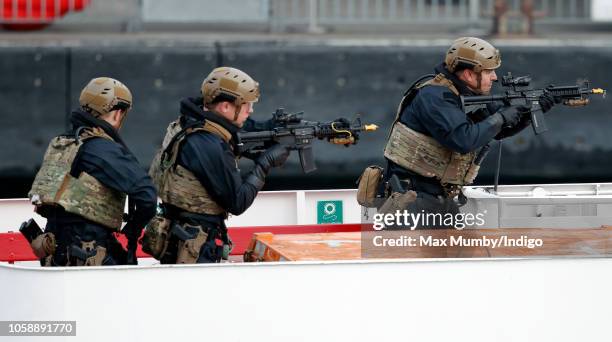 Royal Marines and the Royal Netherlands Marine Corps take part in an on-the-water capability demonstration, on the River Thames, watched by King...