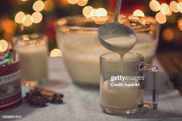 eggnog at christmas time - eggnog stock pictures, royalty-free photos & images