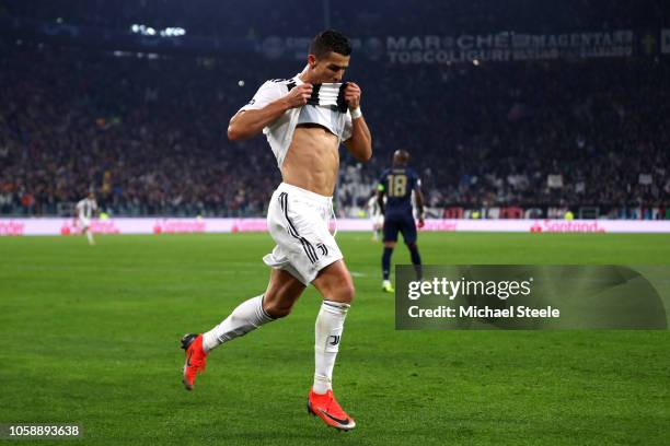 Cristiano Ronaldo of Juventus celebrates after he scores his sides first goal during the UEFA Champions League Group H match between Juventus and...