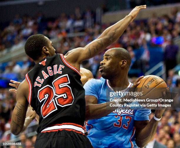 The Clippers' Antawn Jamison tries to get past the Chicago Bulls' Marquis Teague at Staples Center in Los Angeles, CA on November 24, 2013. The...