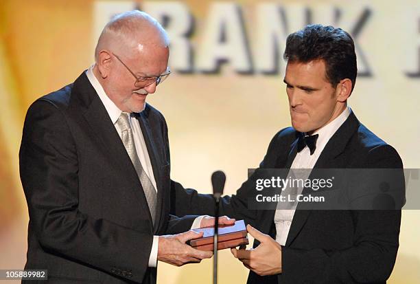 Frank Pierson accepts the Morgan Cox Award from presenter Matt Dillon