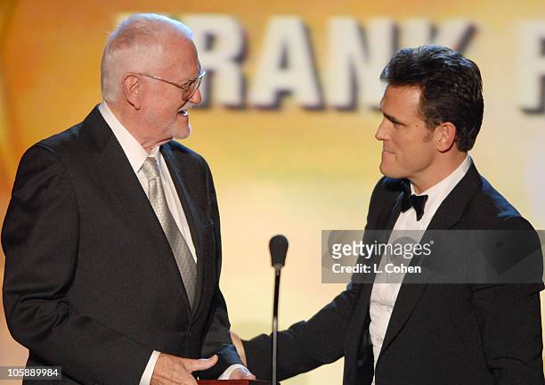 Frank Pierson accepts the Morgan Cox Award from presenter Matt Dillon