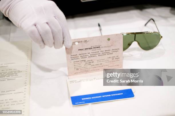 Joe Jackson's bank deposit slip for The Jackson 5 is seen at the Iconic Hollywood & Music Memorabilia Auction media preview at Universal Hilton Hotel...