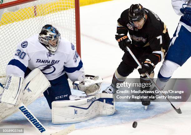 The Ducks' Andrew Cogliano tries to get a shot past the Tampa Bay Lightning goalie Ben Bishop at Honda Center in Anaheim on November 22, 2013.