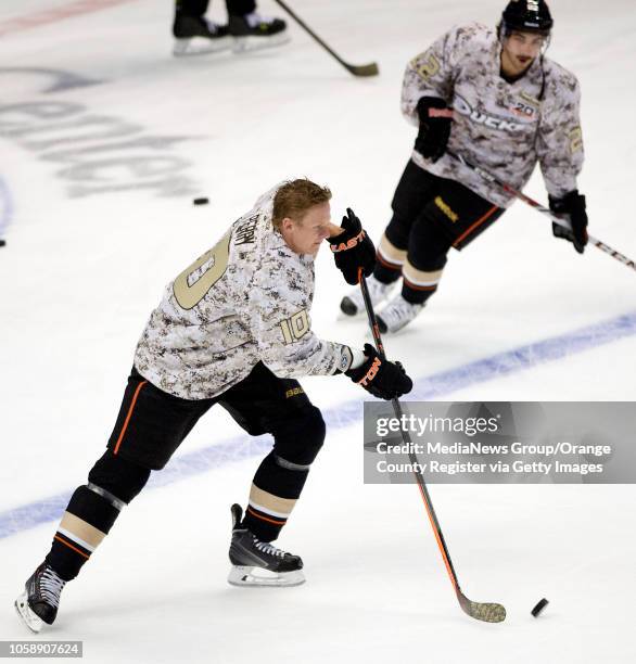 The Ducks' Corey Perry warms up in a camouflage jersey as part of Military Appreciation Night at Honda Center in Anaheim on November 10, 2013.