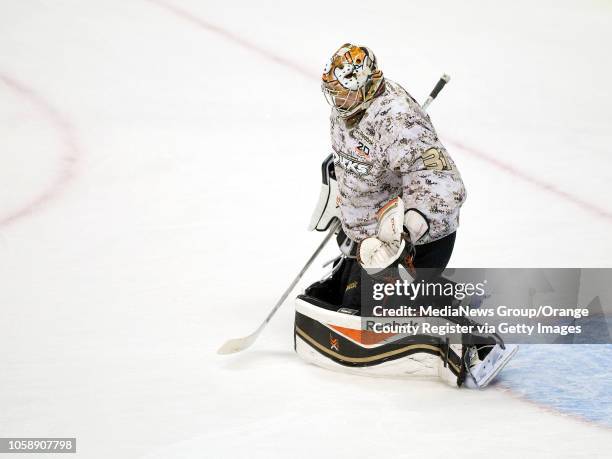 Ducks goalie Frederik Andersen warms up in a camouflage jersey as part of Military Appreciation Night at Honda Center in Anaheim on November 10, 2013.