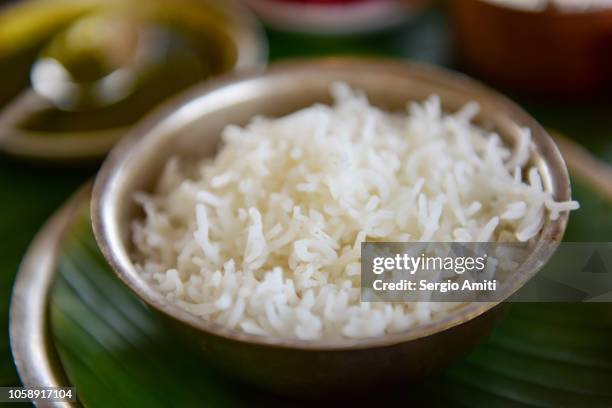 steamed rice bowl - rice bowl stock-fotos und bilder