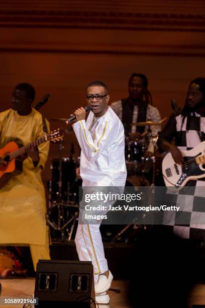 Senegalese singer and composer Youssou N'Dour performs with his band, le Super Etoile de Dakar, at Carnegie Hall, New York, New York, October 20,...