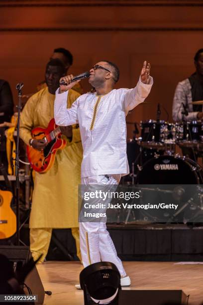 Senegalese singer and composer Youssou N'Dour performs with his band, le Super Etoile de Dakar, at Carnegie Hall, New York, New York, October 20,...