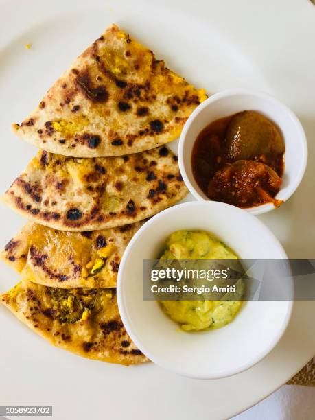 paratha, indian flat bread - parantha stock-fotos und bilder