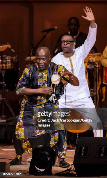 Senegalese musician Assane Thiam plays tama as he performs with Youssou N'Dour and his band, le Super Etoile de Dakar, at Carnegie Hall, New York,...