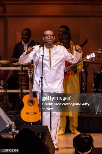 Senegalese singer and composer Youssou N'Dour performs with his band, le Super Etoile de Dakar, at Carnegie Hall, New York, New York, October 20,...