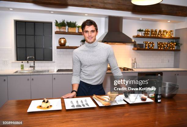 Antoni Porowski demonstrates preparing a signature dish as he attends Boursin Friendsgiving at Home Studios on November 7, 2018 in New York City.