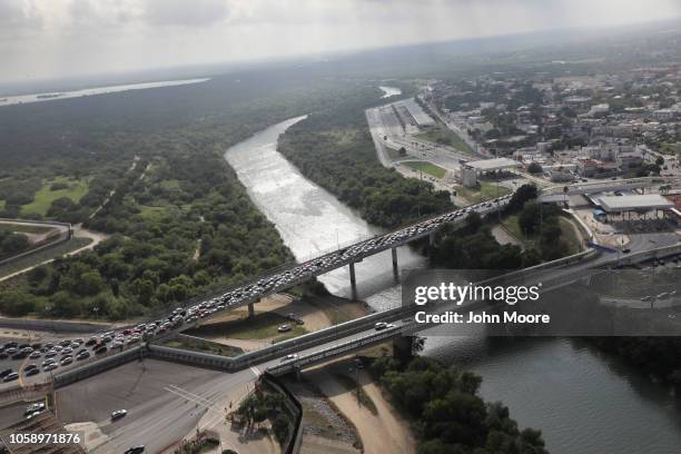 Traffic waits on the international bridge to cross into the United States at the U.S.-Mexico border on November 7, 2018 in Hidalgo, Texas. U.S. Army...