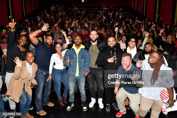 Michael B. Jordan, Florian Munteanu, and Director Steven Caple Jr. Pose with moviegoers during the "Creed 2" Atlanta screening at Regal Atlantic...