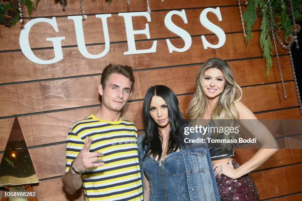 James Kennedy, Scheana Marie and Raquel Leviss, wearing GUESS, attend the GUESS Holiday 2018 Event on November 7, 2018 in West Hollywood, California.
