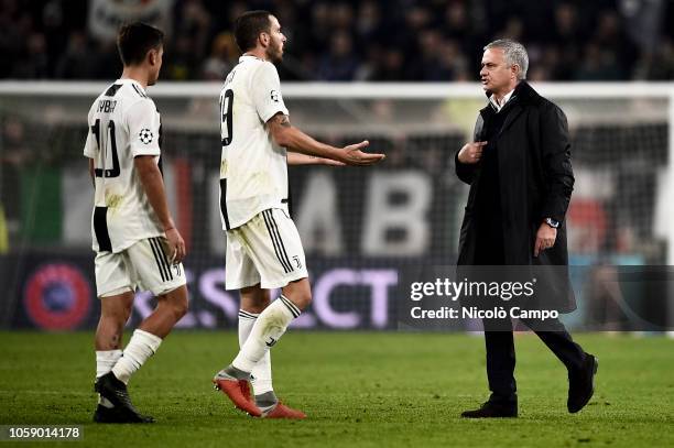 Jose Mourinho , head coach of Manchester United FC, speaks with Leonardo Bonucci of Juventus FC at the end of the Group H football match of the UEFA...