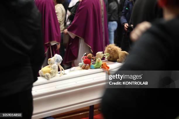 Some toys on the coffin of one of the children who died in the tragedy of Casteldaccia during the funeral of the nine victims of the flood that...