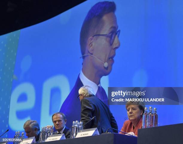 The President of the European Commission Jean-Claude Juncker leaves the podium as European Parliament President Antonio Tajani , the President of the...