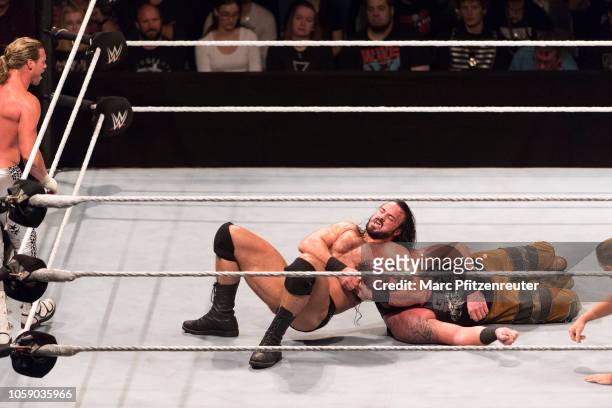 Drew McIntyre competes in the ring against Braun Strowman during the WWE Live Show at Lanxess Arena on November 7, 2018 in Cologne, Germany.