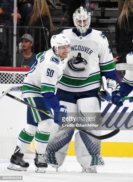 Markus Granlund and Jacob Markstrom of the Vancouver Canucks celebrate after the team's 3-2 shootout victory over the Vegas Golden Knights at...