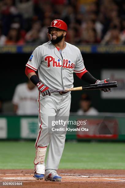 Infielder Carlos Santana of the Philadelhia Phillies reacts after strike out in the top of 1st inning during the exhibition game between Yomiuri...