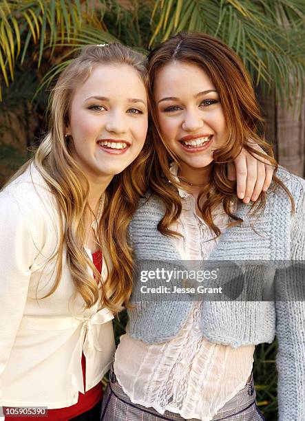 Emily Osment and Miley Cyrus during Stars of Disney Channel's "Hannah Montana" Meet the Press at Ritz Carlton Huntington Hotel in Pasadena,...
