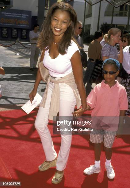 Garcelle Beauvais and Son Oliver Saunders during "A Simple Wish" Premiere at Cineplex Odeon in Universal City, California, United States.