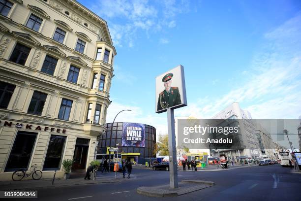 People visit the check point Charlie on the 29th anniversary of the fall of the Berlin Wall in Berlin, Germany on November 8, 2018. Brandenburg Gate...