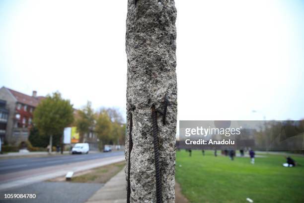 People visit the wall on the 29th anniversary of the fall of the Berlin Wall in Berlin, Germany on November 8, 2018. Brandenburg Gate is an...