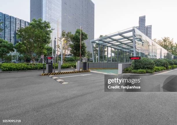 parking garage entrance - boom barrier stock pictures, royalty-free photos & images