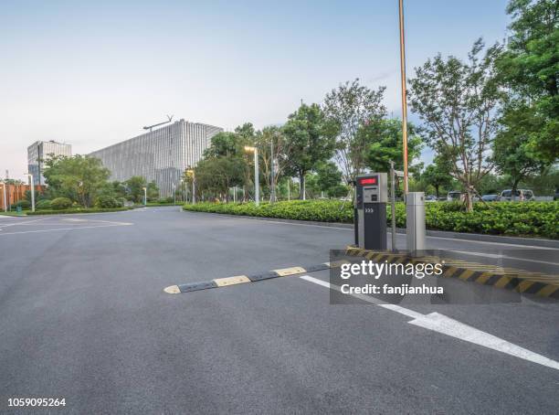 parking garage entrance - boom barrier stock pictures, royalty-free photos & images