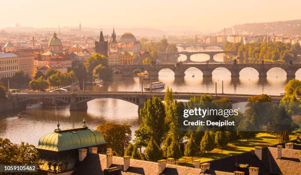 aerial view of the the charles bridge and vltava river in prague, czech republic - vltava river stock pictures, royalty-free photos & images