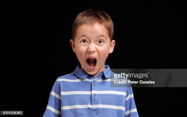 furious boy shouting - hate stock-fotos und bilder