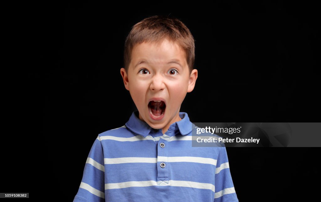 Furious boy shouting