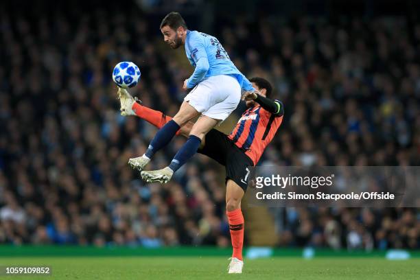 Bernardo Silva of Man City battles with Taison of Shakhtar during the Group F match of the UEFA Champions League between Manchester City and Shakhtar...